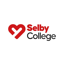 Selby College logo featuring a red heart symbol next to bold black text, highlighting educational support at York Pride.