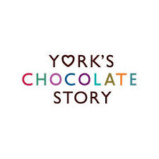 Alt text: York's Chocolate Story logo with colourful, rainbow-themed letters on a white background.