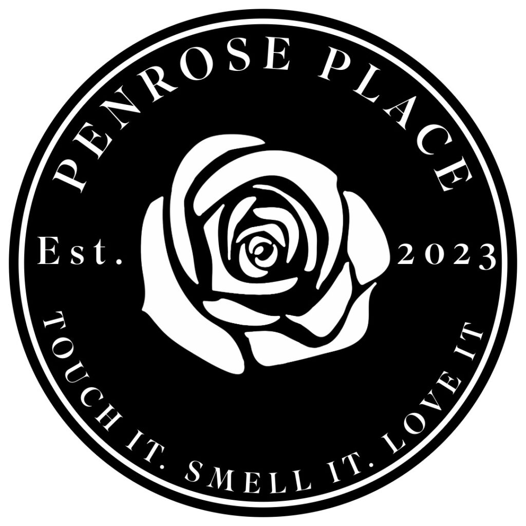 Sure! Here is the alt text:Black logo with stylised rose. Text: 'Penrose Place Est. 2023 Touch It. Smell It. Love It.'