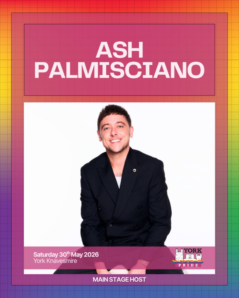 ```plaintext
Image of Ash Palmisciano, host at York Pride's main stage event on 30th May 2026, set against a rainbow gradient.
```
