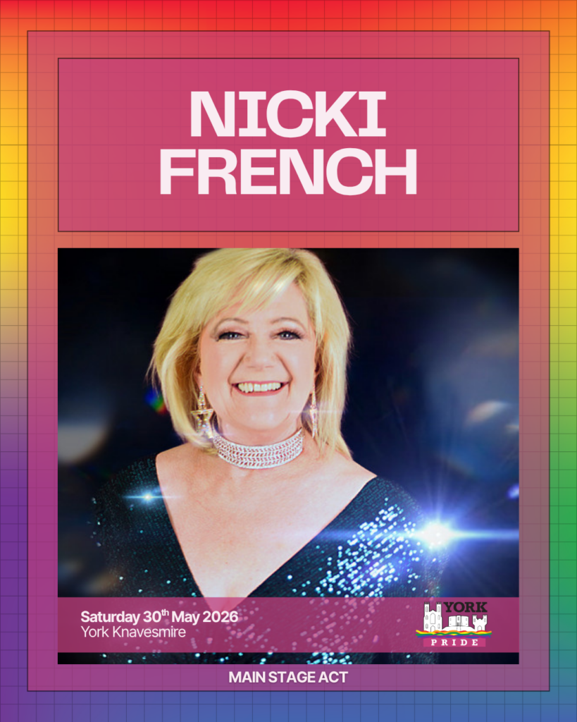 Here's a suggestion for the alt text:Performer smiling under lights, York Pride 2026 poster, main stage act announcement.