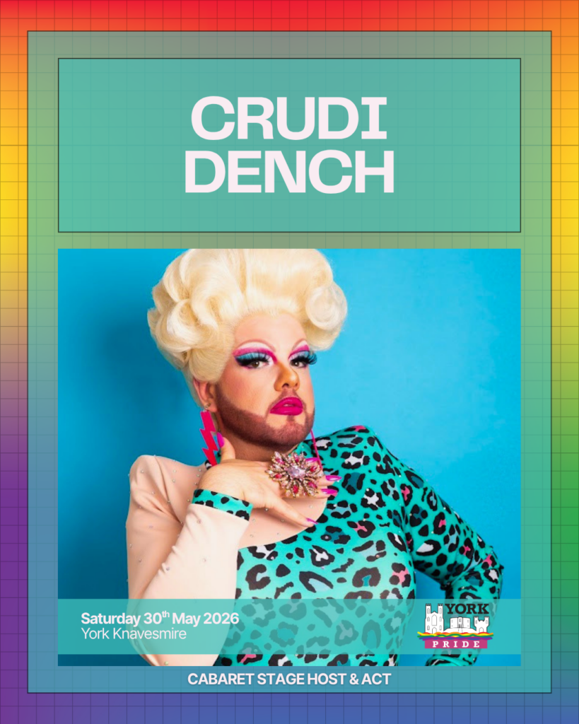Drag performer with blonde wig and colourful leopard print dress at York Pride Cabaret Stage, May 2026.