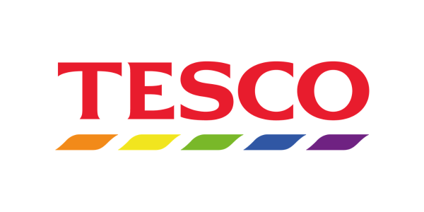 ```markdown
Alt text: Tesco logo with rainbow stripes, symbolising support for LGBT+ community, on a white background.
```